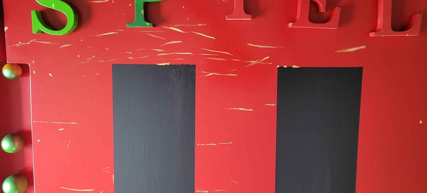 Ein Bild Ausschnitt mit den Buchstaben SPIEL